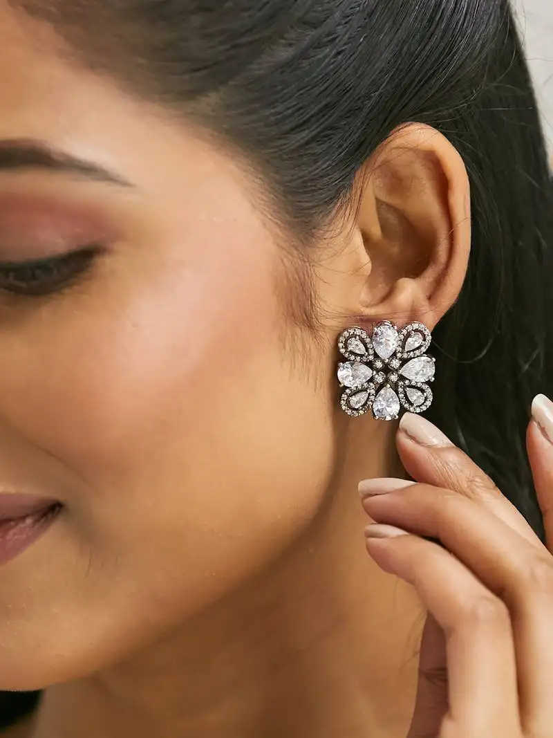 Gold plated crystal & zircon stone studded floral studs