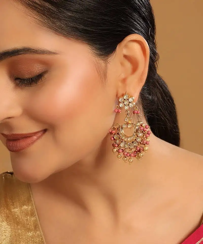 Gold plated kundan chandbali earrings with pink stones