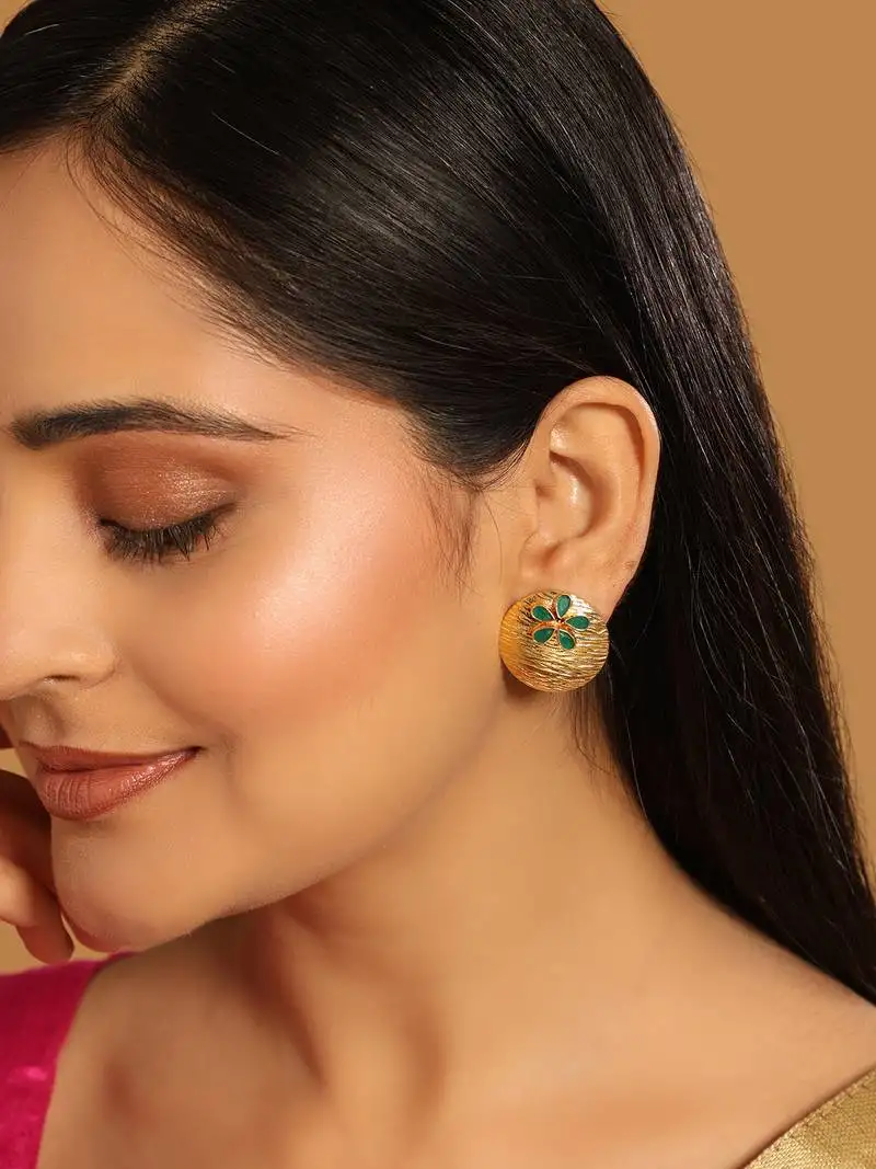 Gold plated faux emerald stones studded circular floral shaped motif studs