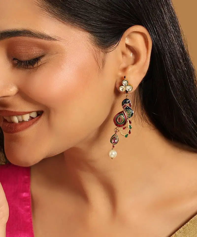 Gold plated pearl drop kundan studded ethnic peacock shaped drop earrings