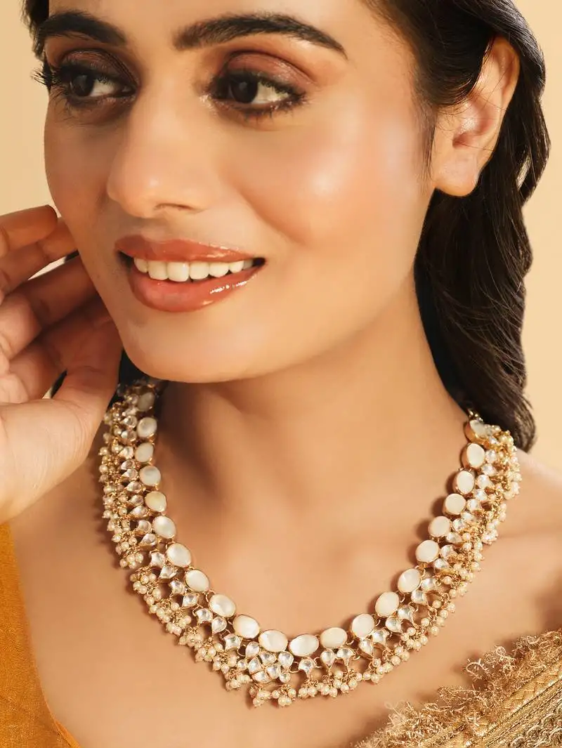 Gold plated ivory dusk mop necklace