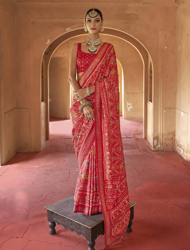 Red poly viscose silk patola printed saree with heavy dimond swarovski work border