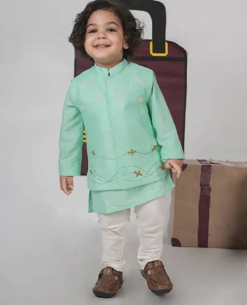 Mint green kurta with aeroplanes::Clouds hand embroidered bundi jacket with pajama set