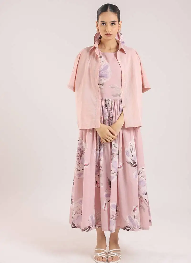 Nude pink floral printed cotton shirt dress paired with a striped slip.