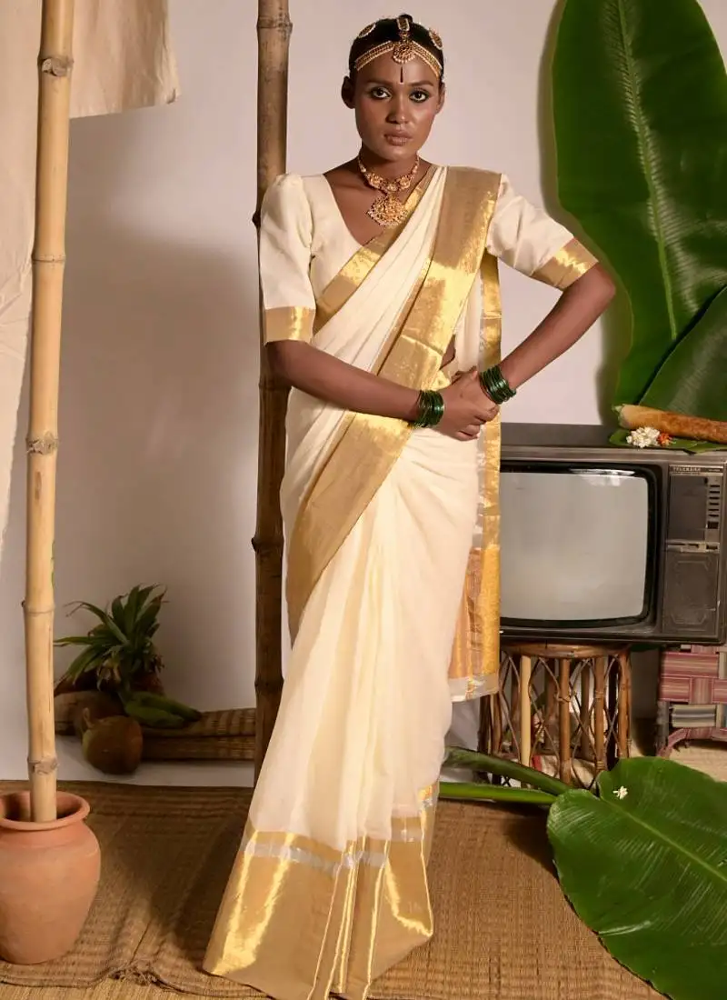 Off white mul cotton handwoven saree with golden border