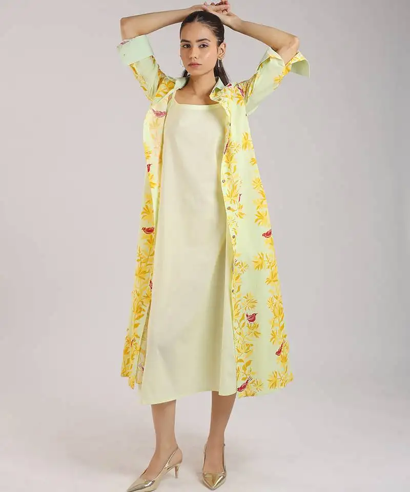 Matcha green floral printed cotton shirt dress paired with a slip.