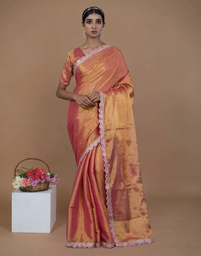 Pink handwoven tissue saree with scalloped lace
