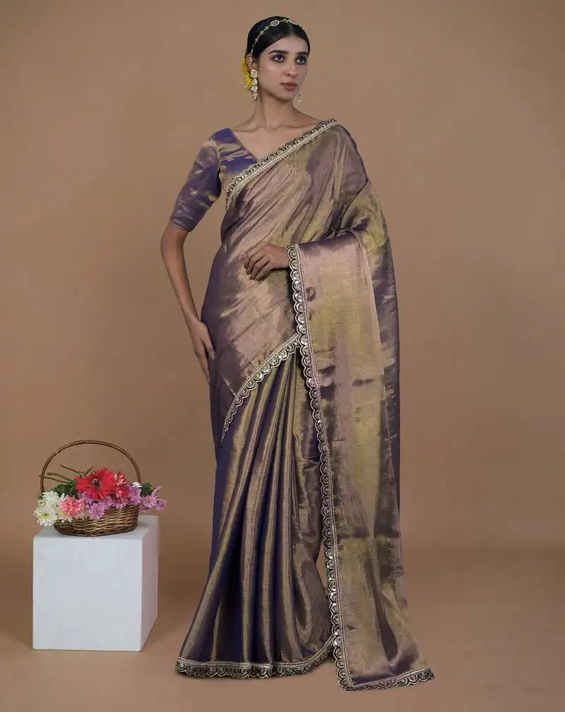 Purple handwoven tissue saree with scalloped lace