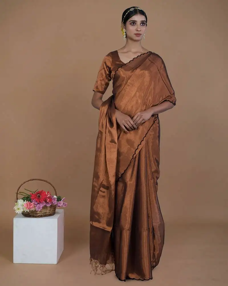 Copper handwoven tissue saree with scalloped pallu and border