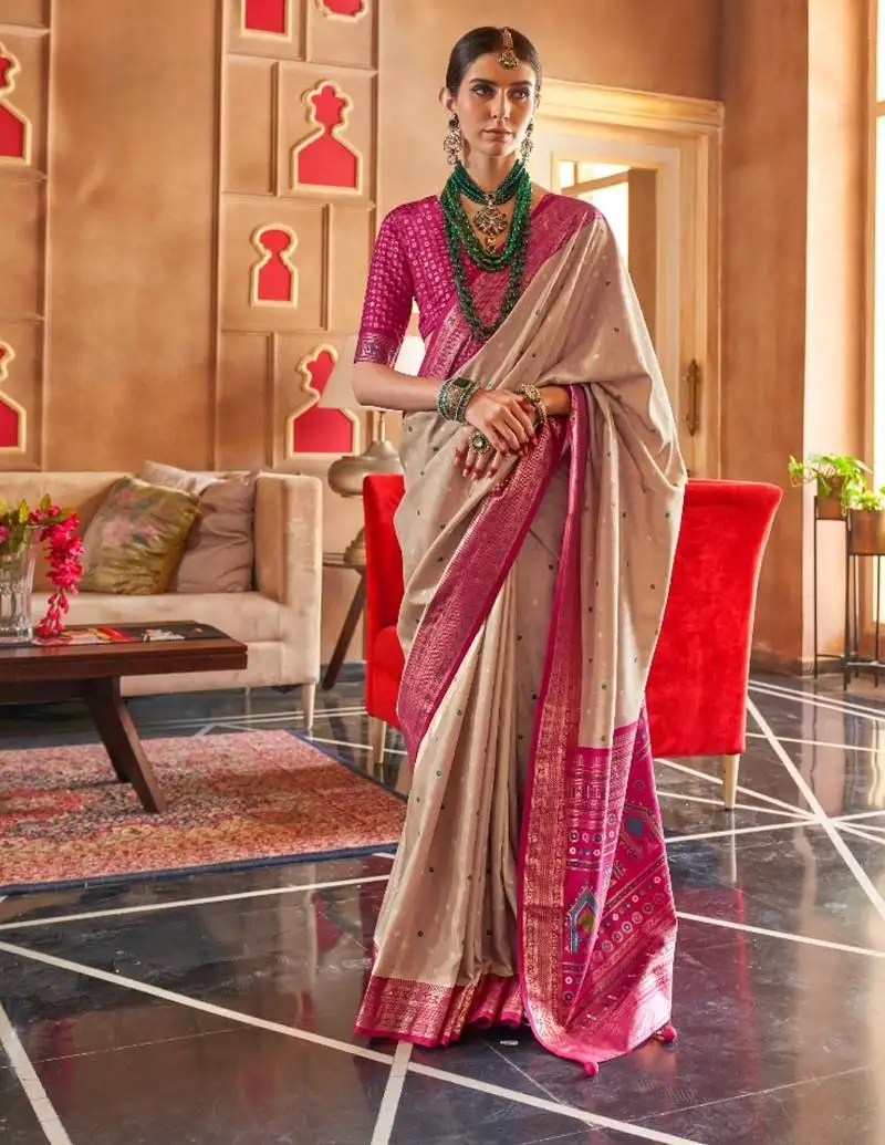 Beige silk blend zari woven patola design saree with blouse