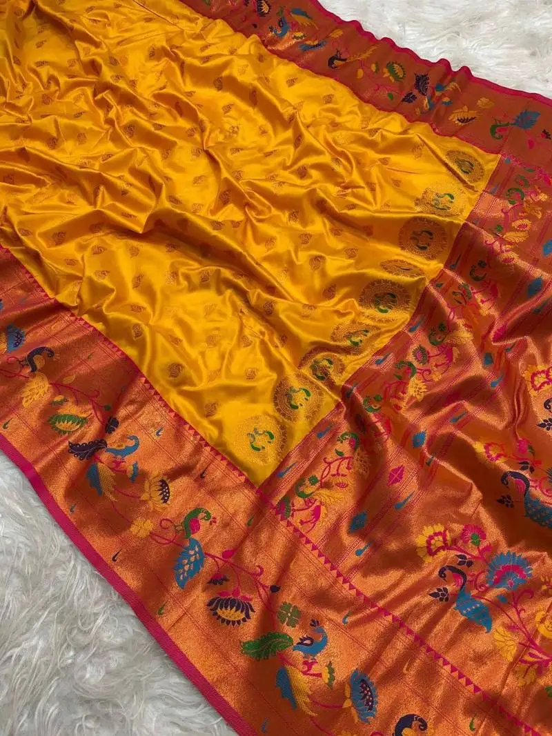 Yellow silk blend saree with paithani weaved pallu and blouse