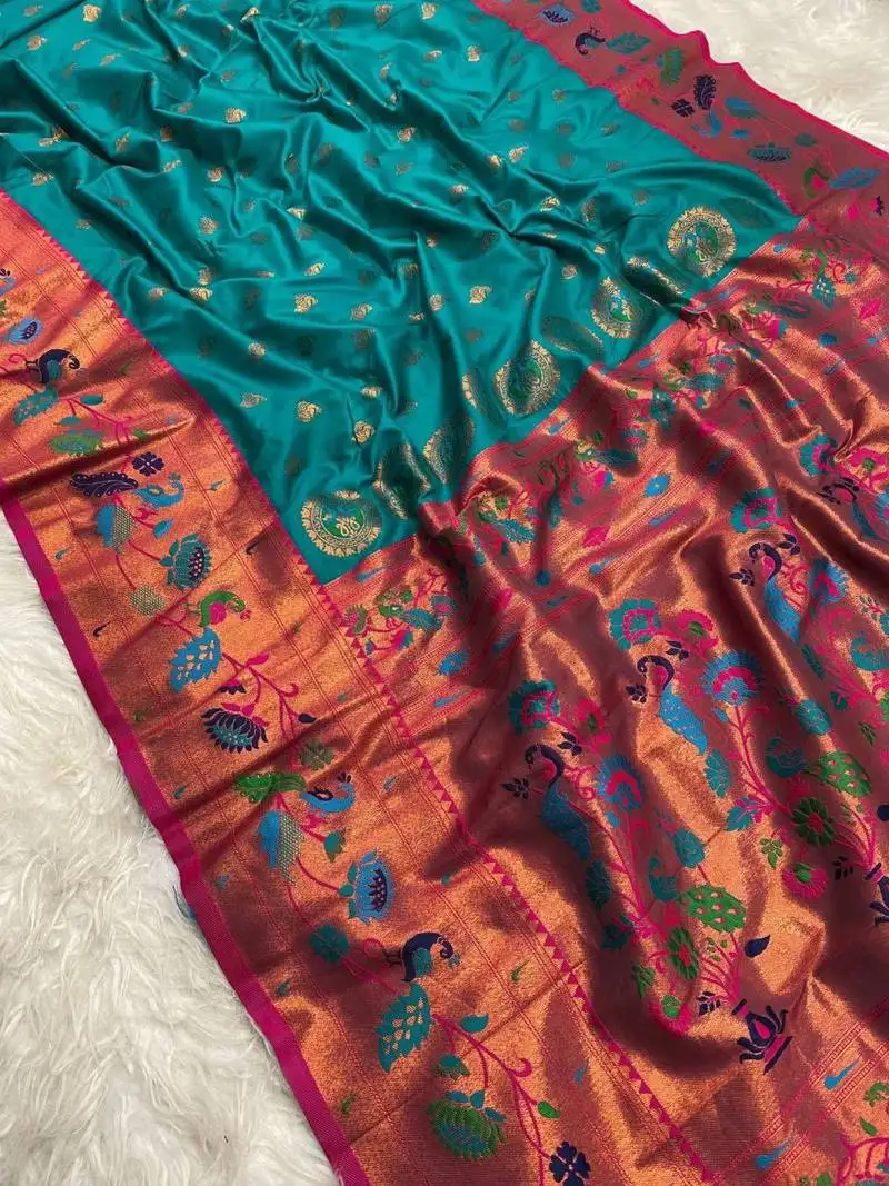 Sky blue banarasi silk blend saree with paithani weaved pallu and blouse