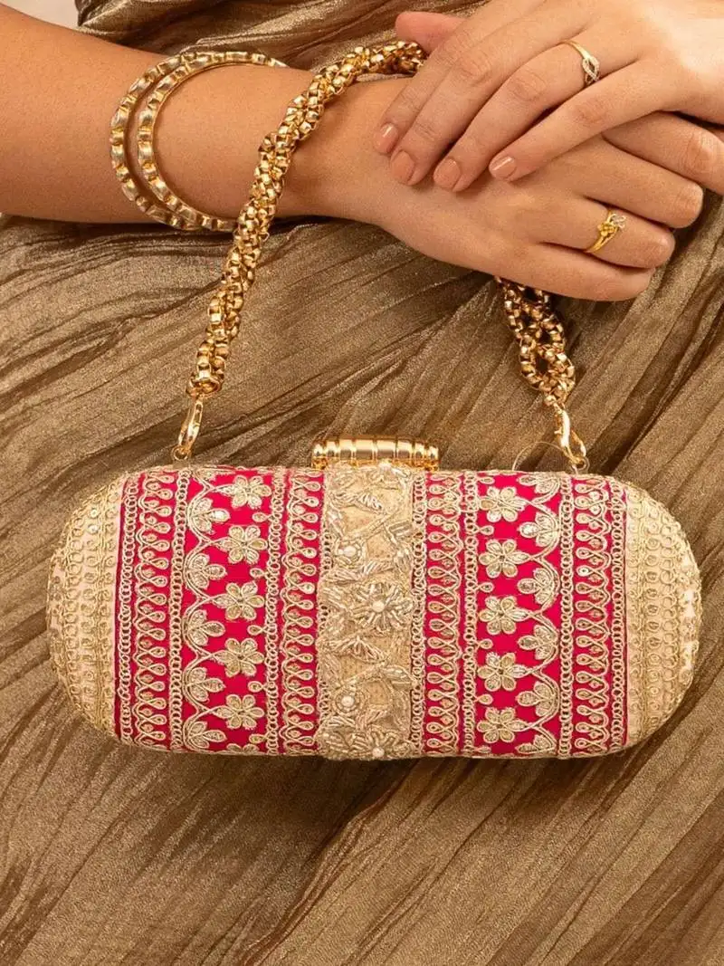 Pink silk embroidered clutch