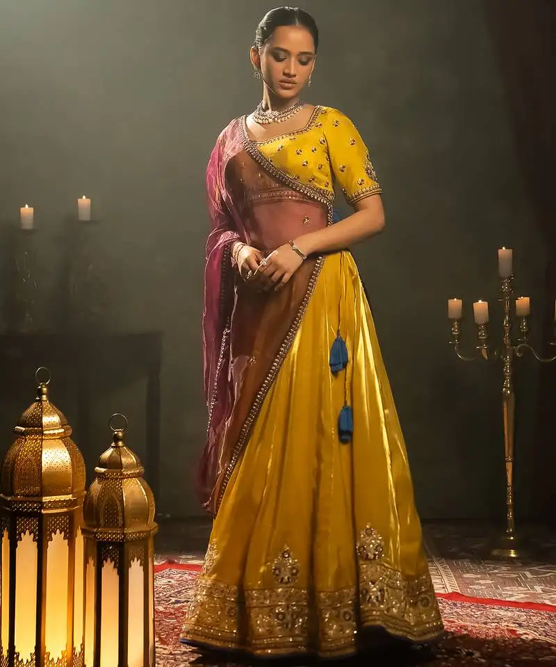 Yellow embroidered tissue lehenga