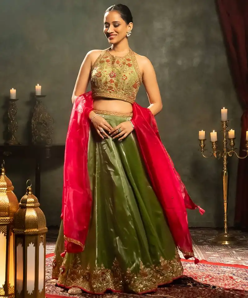 Green embroidered tissue lehenga