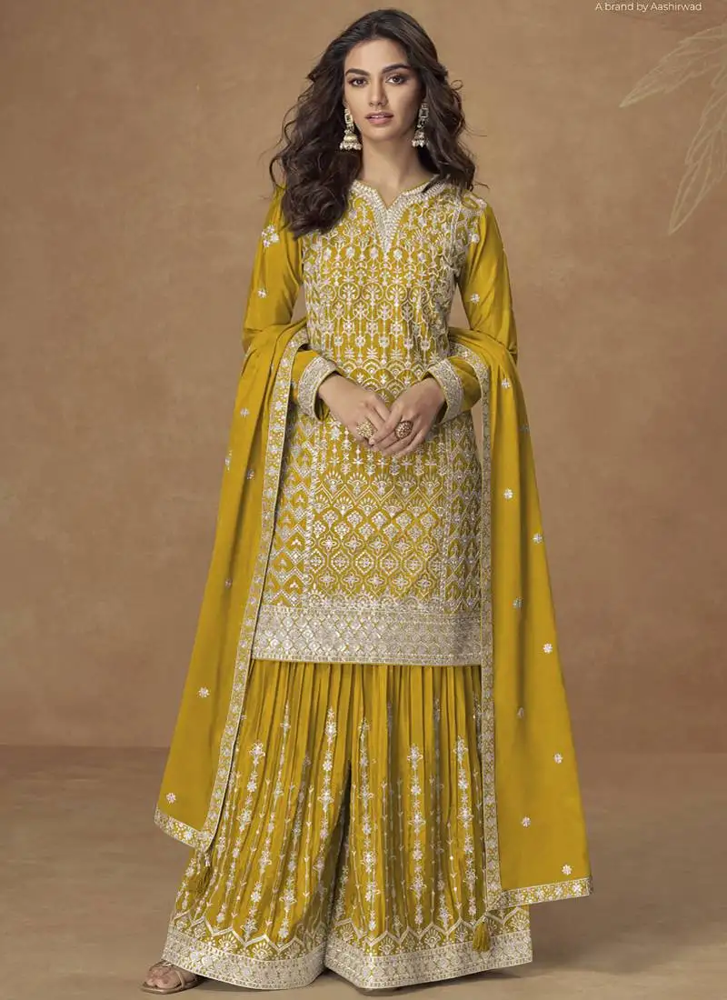 Yellow chinon silk embroidered sharara suit stitched