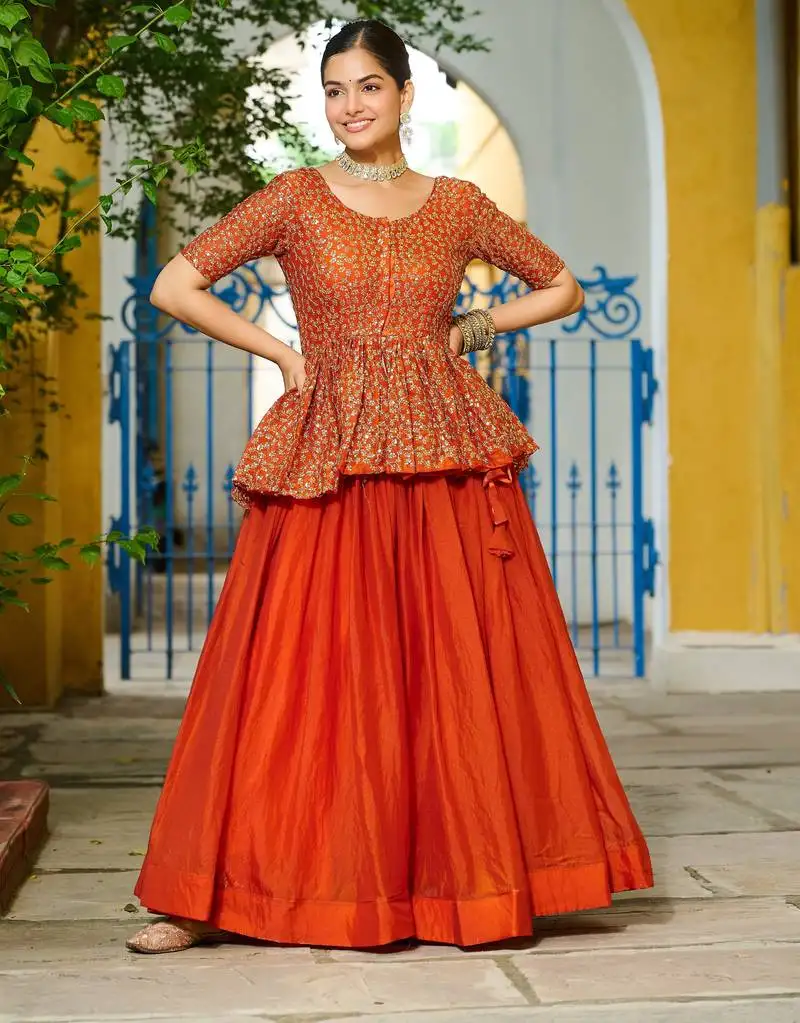 Orange embroidered work fendy silk onam stitched lehenga choli
