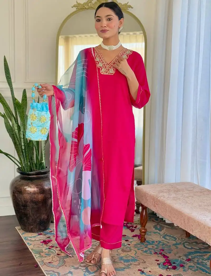 Rani pink rayon slub heavy thread embroidery work with printed dupatta kurta pant set