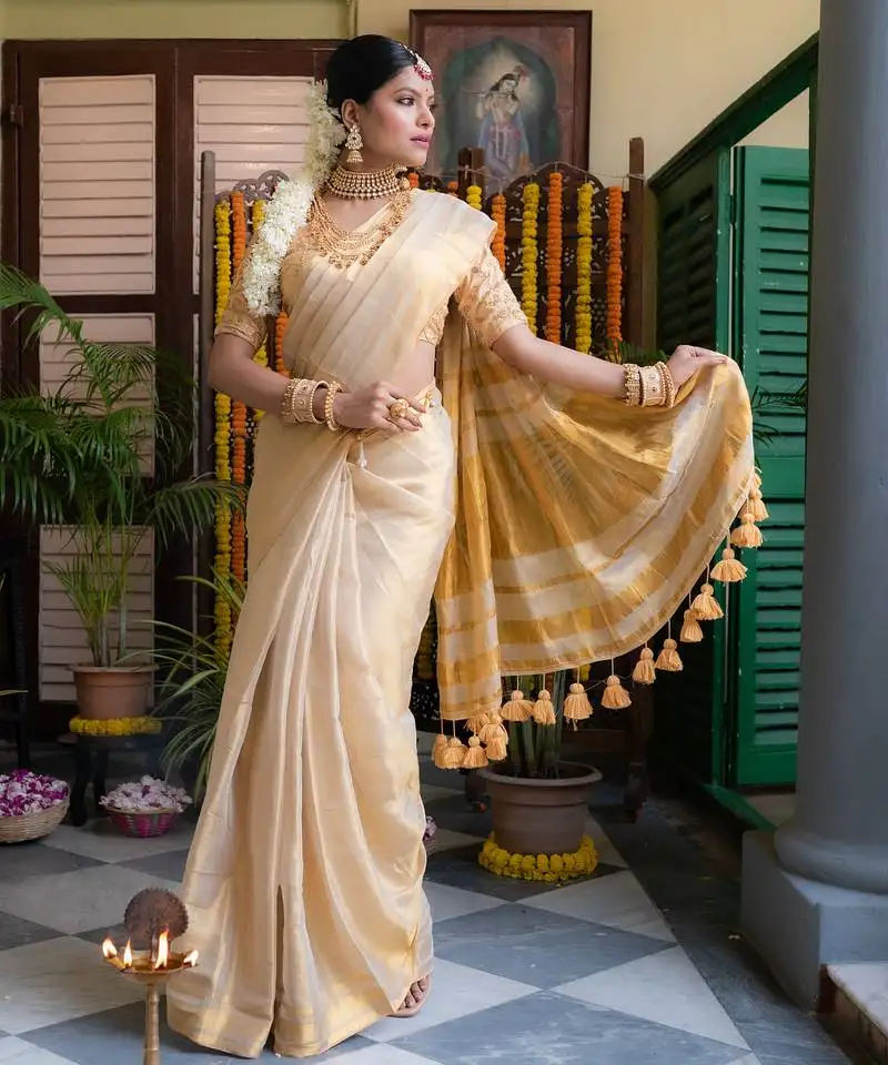 Gold mul cotton tissue saree
