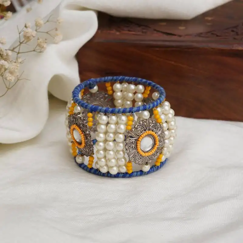 Vintage look pearl and beaded bangle