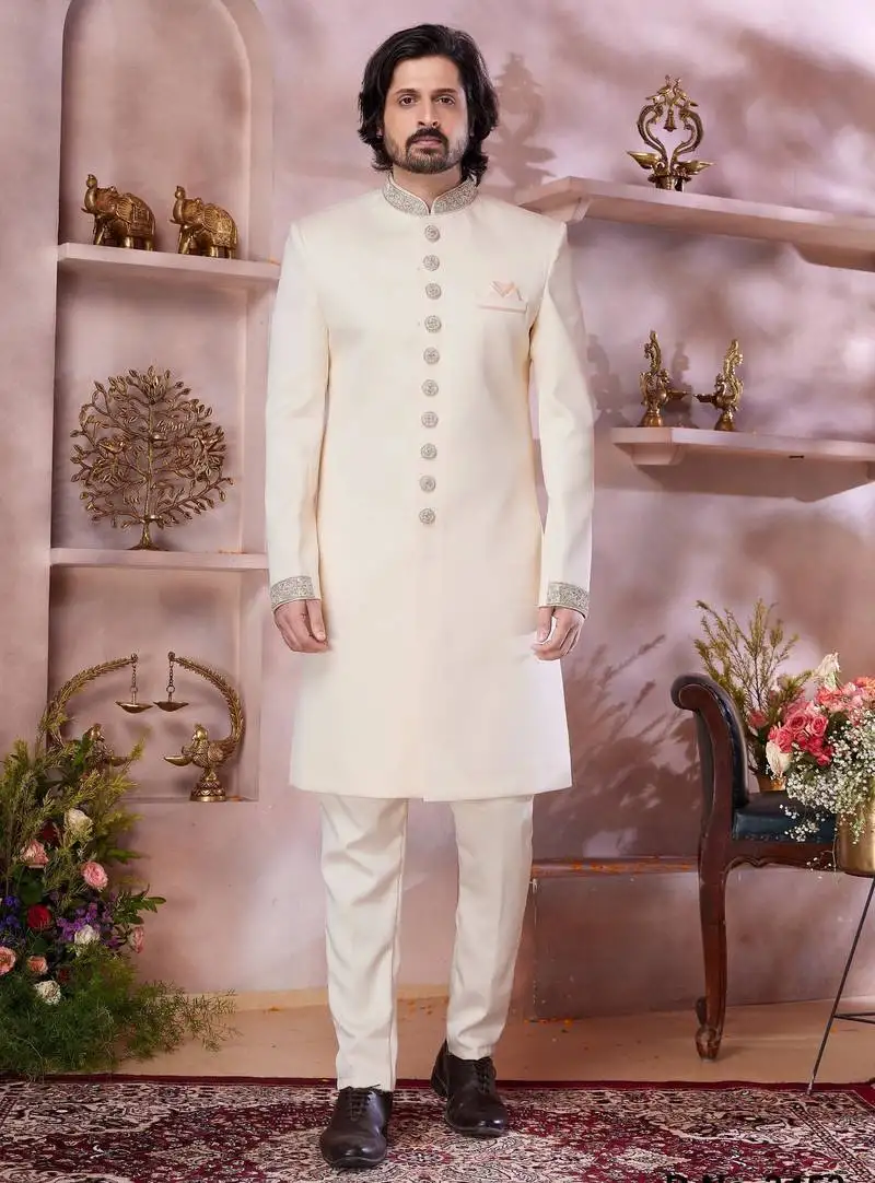 Cream imported plain fabric sherwani with faux satin churidar foe men