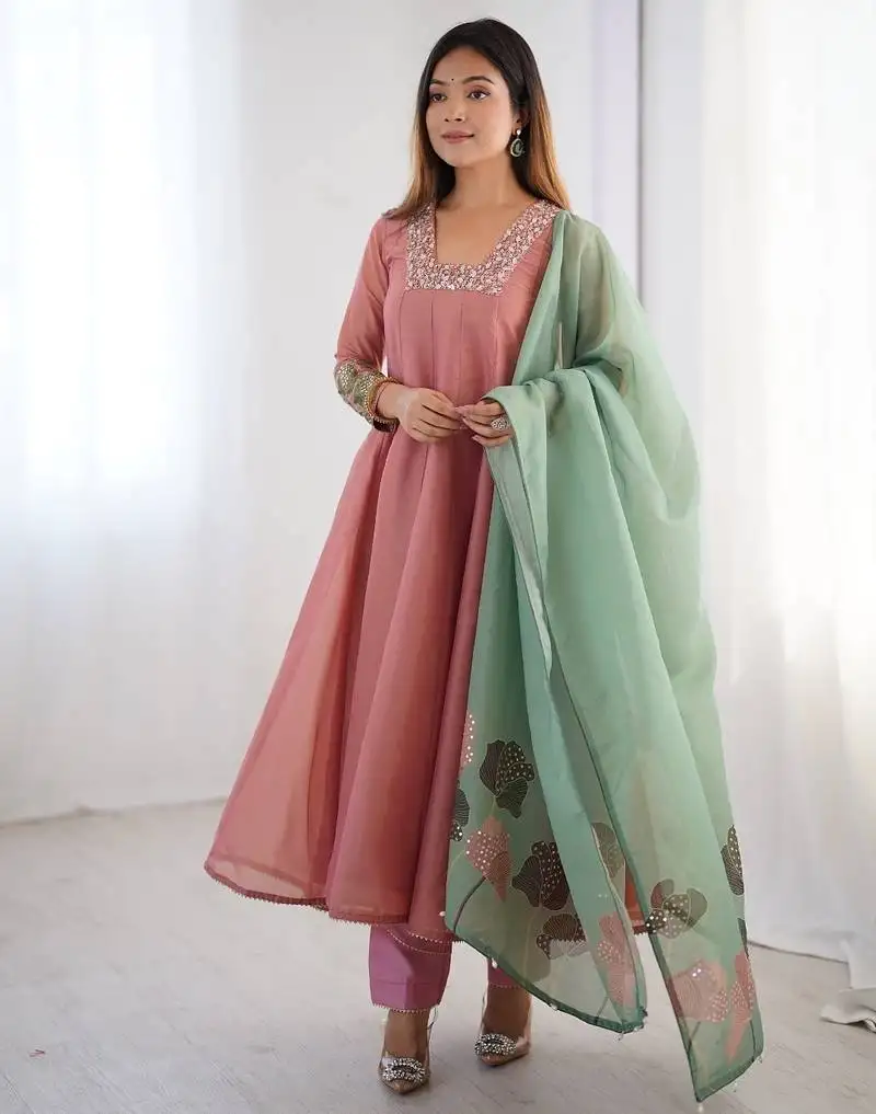 Peach tissue silk anarkali suit with handwork and printed organza dupatta stitched