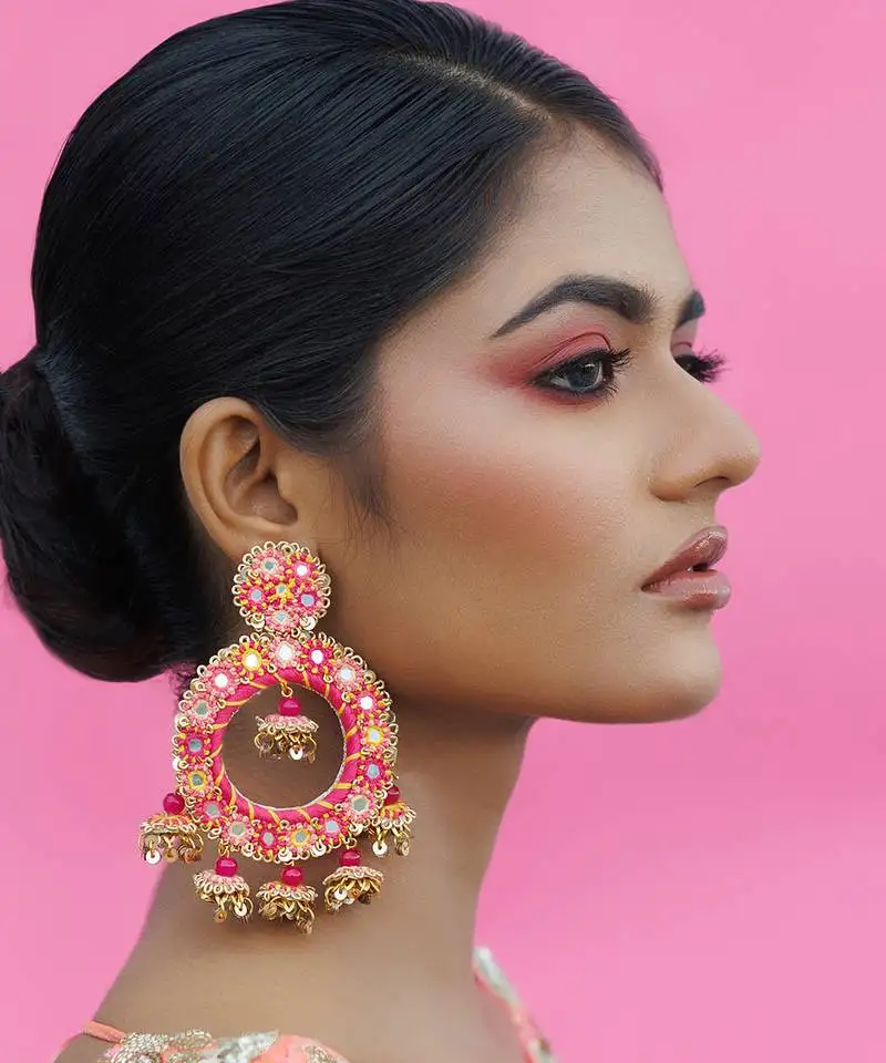Pink metal based yellow gold plated earrings