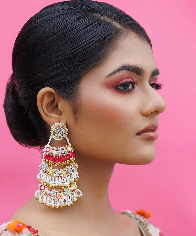 White metal based yellow gold plated earrings