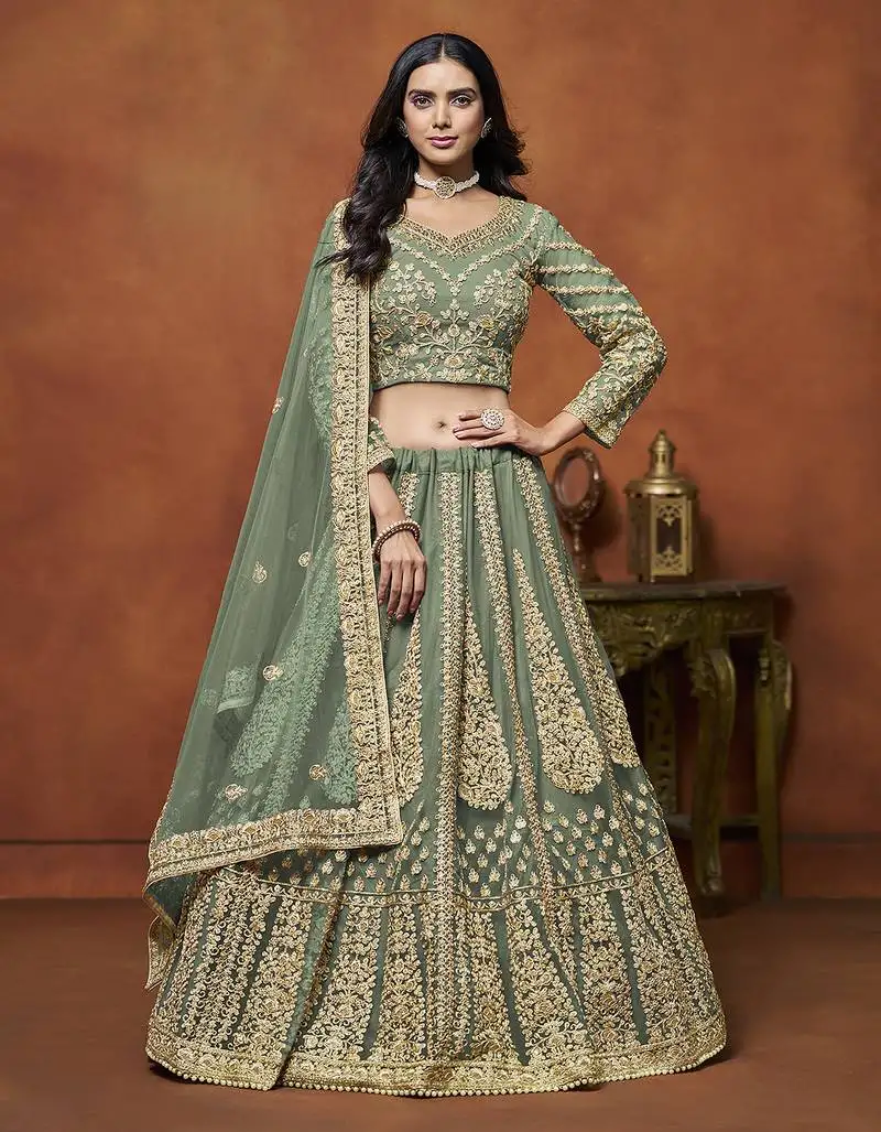 Pista green embroidered zari sequins coading net lehenga