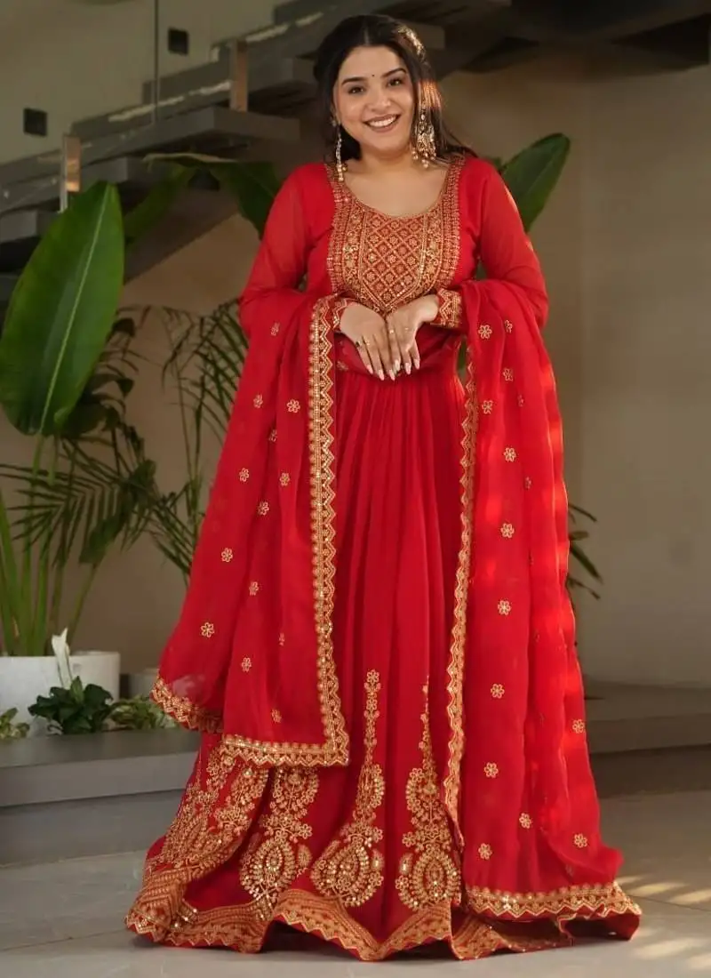 Red faux blooming with embroidery zari sequins work gown stitched