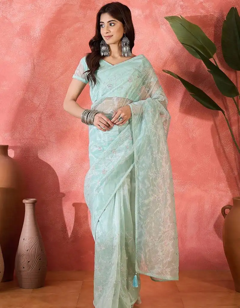 Sea green twill net sequins embroidered saree