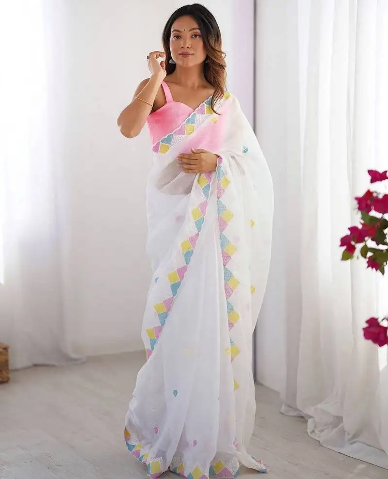 White embroidered jimmy choo saree