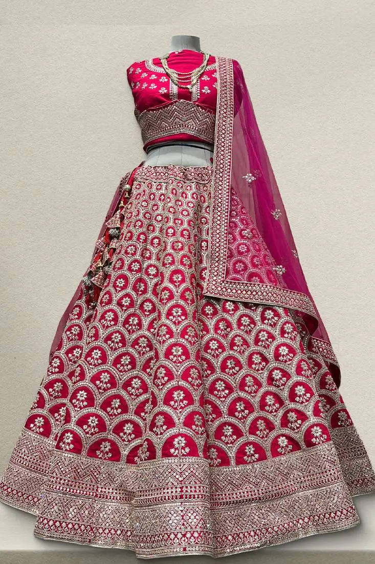 Rani pink raw silk lehenga with unstitched blouse