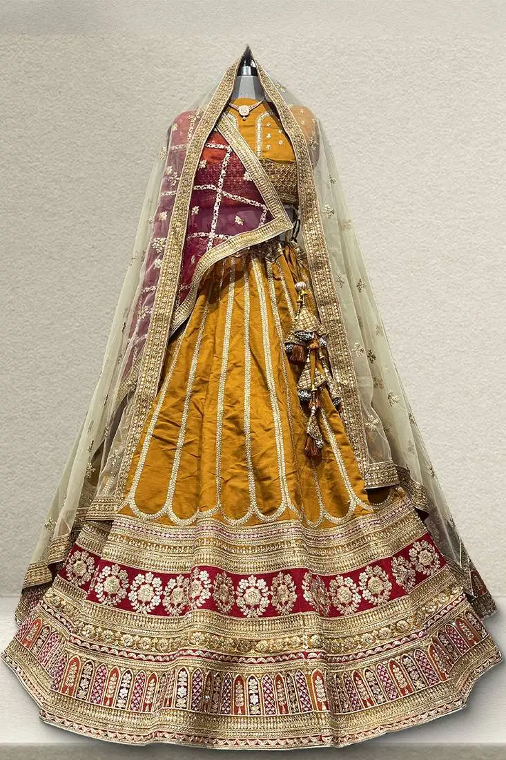Double dupatta raw silk gold designer lehenga with unstitched blouse