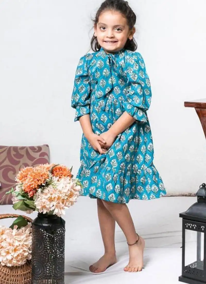 Blue block printed soft cotton long sleeves ruffled knee length dress for girls