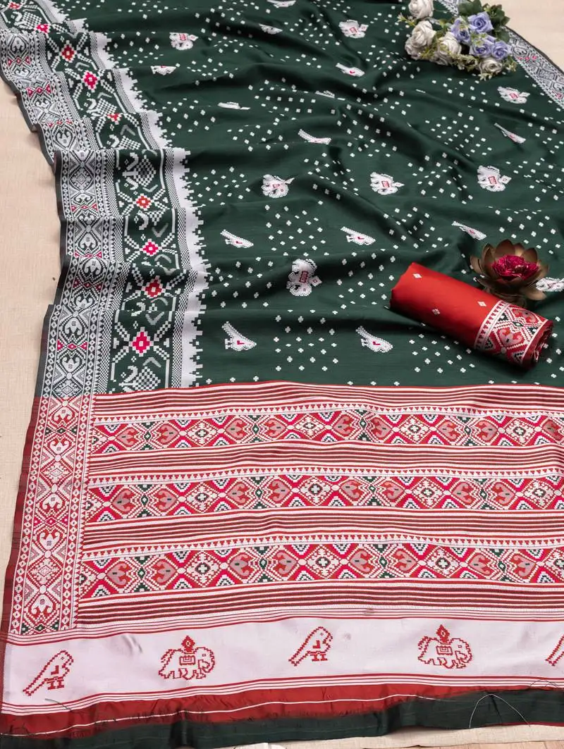 Green soft litchi silk blend saree with traditional motifs and finished with a luxurious zari pallu