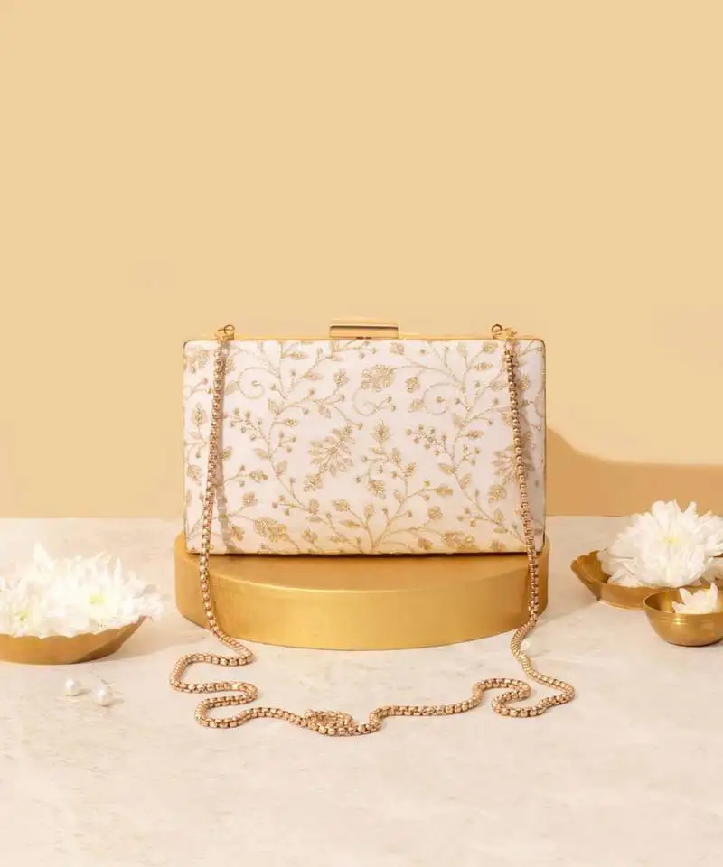 White suede embroidered sling bag