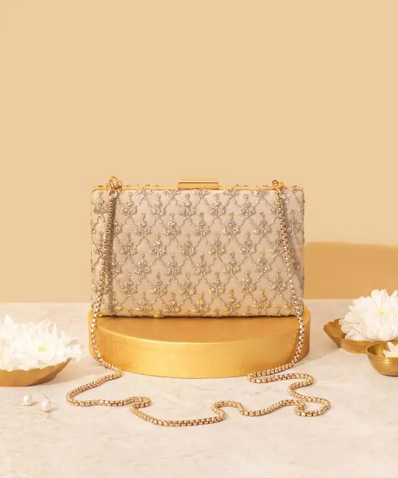 Pink suede embroidered sling bag