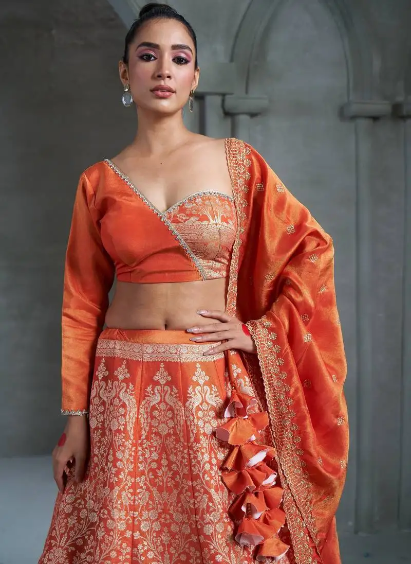 Orange viscose tissue embroidered stitched lehenga choli with duptta