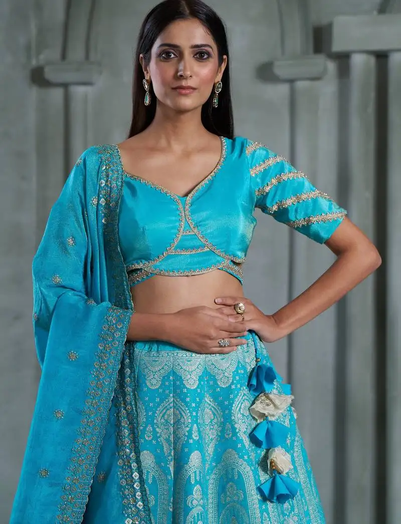 Sky blue viscose tissue embroidered stitched lehenga choli with duptta