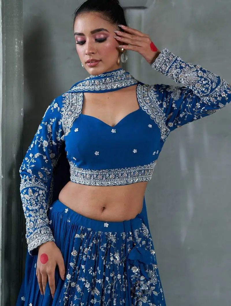 Blue viscose tissue embroidered stitched lehenga choli with duptta