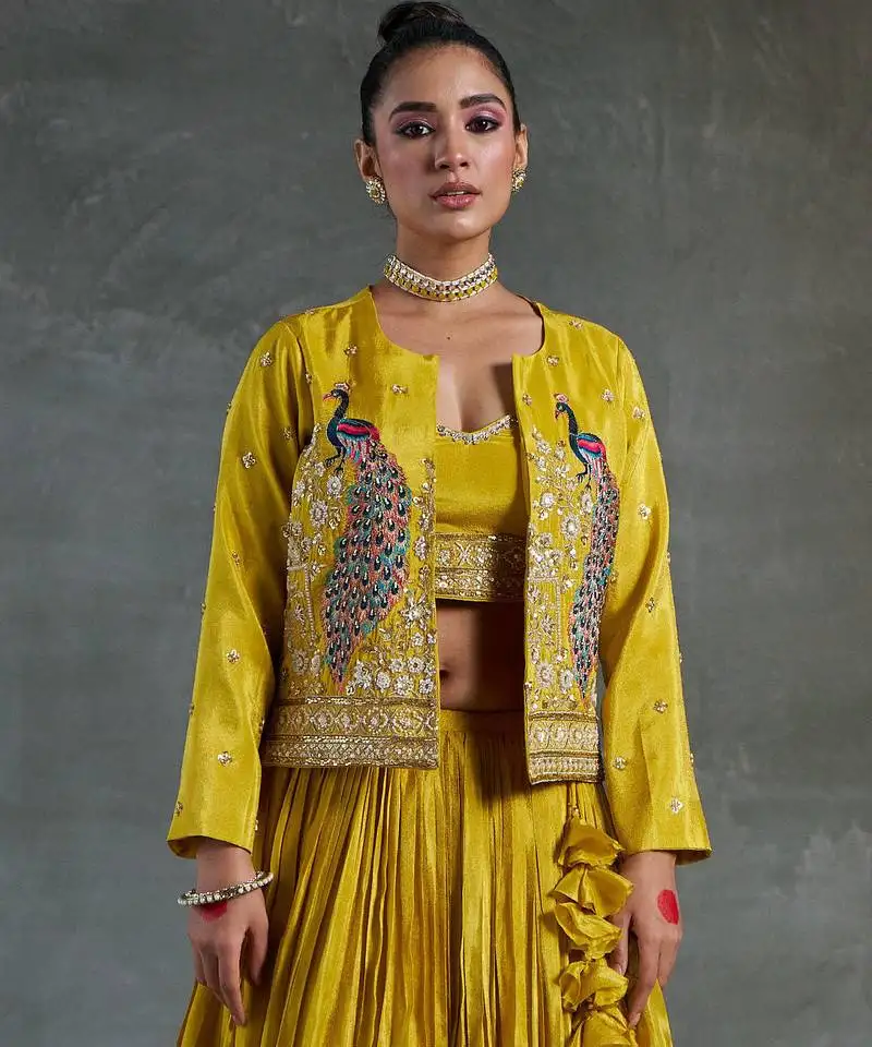 Yellow viscose tissue embroidered stitched lehenga choli with duptta