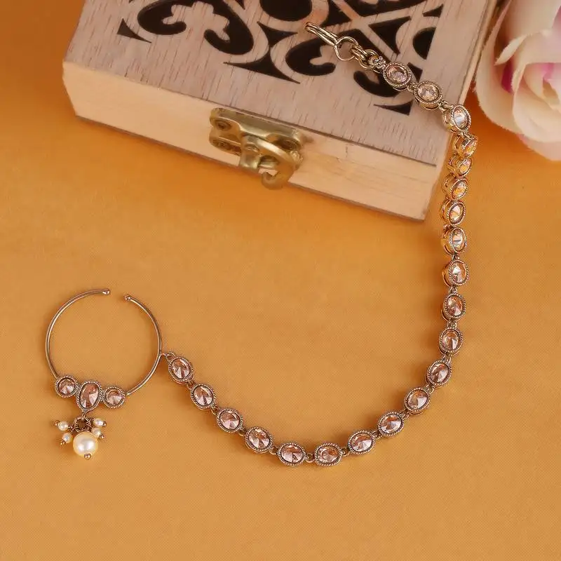 Traditional round shape crystal gold plated nose ring with chain(nathiya)
