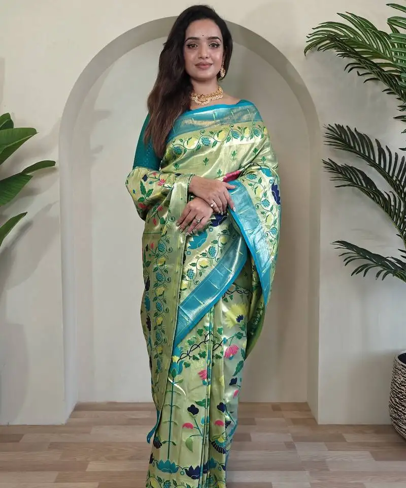 Green paithani silk blend saree with rich contrast weaving pallu and border & blouse