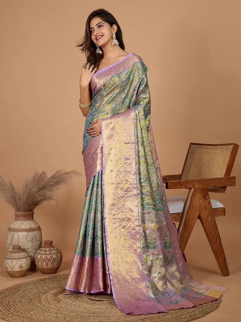 Green woven banarasi design saree with blouse piece