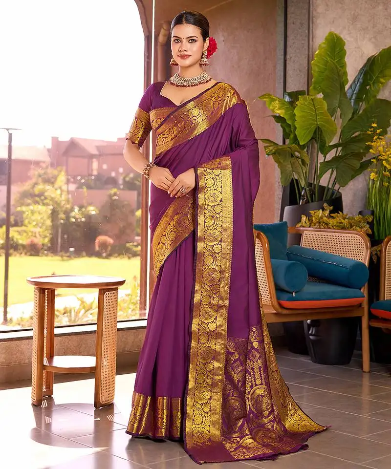Magenta woven kanchipuram style saree with blouse piece