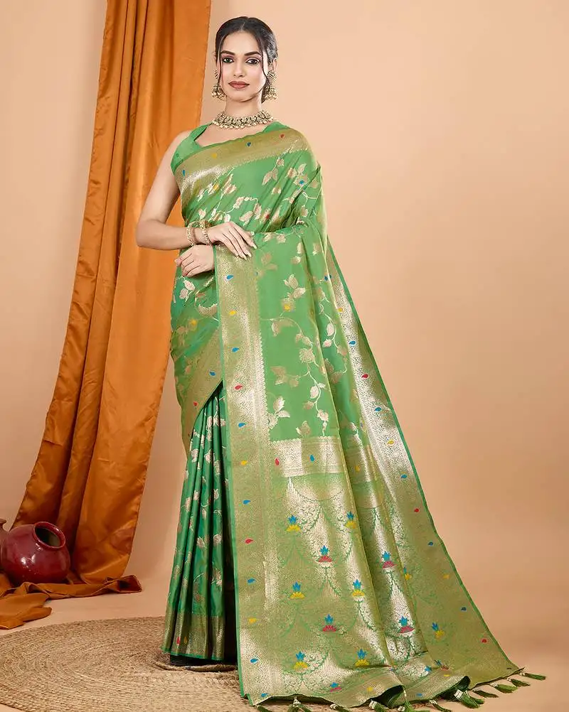 Light green woven banarasi design saree with blouse piece