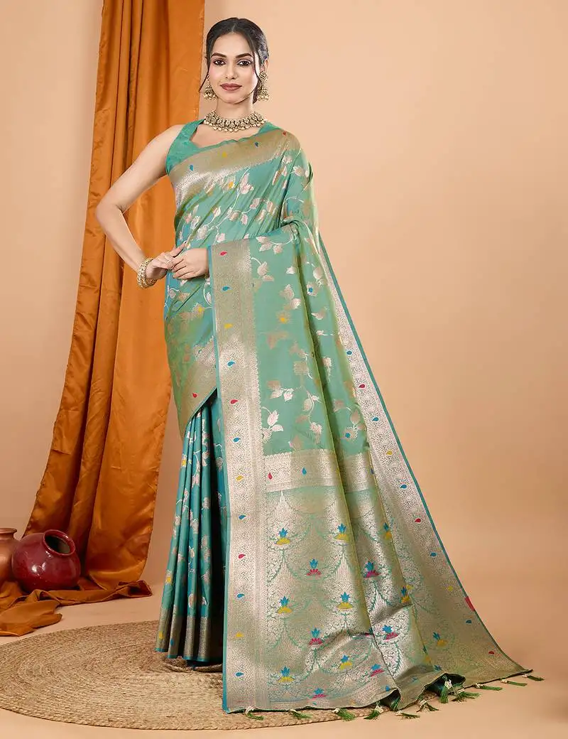 Sea green woven banarasi design saree with blouse piece