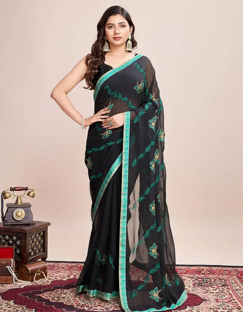 Green embroidered georgette saree with blouse piece