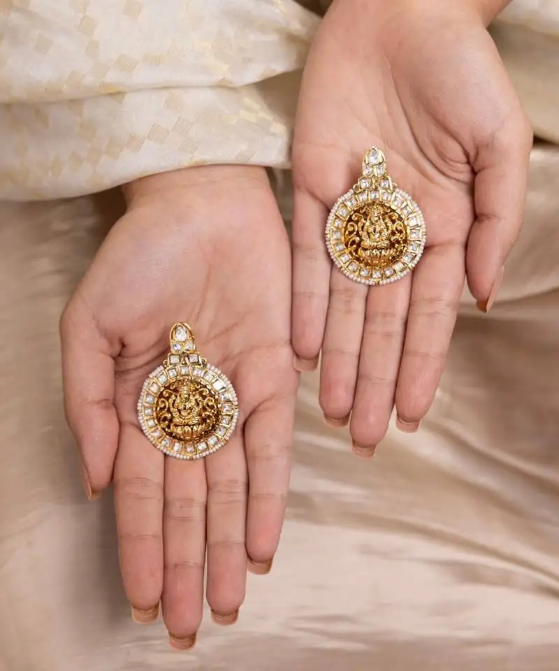 Gold plated temple stud earrings